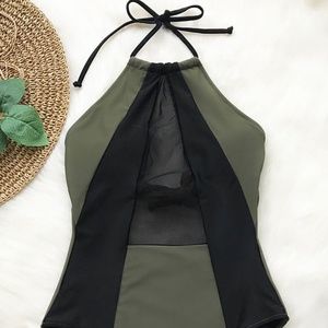 One-piece green, black, sheer color block swimsuit